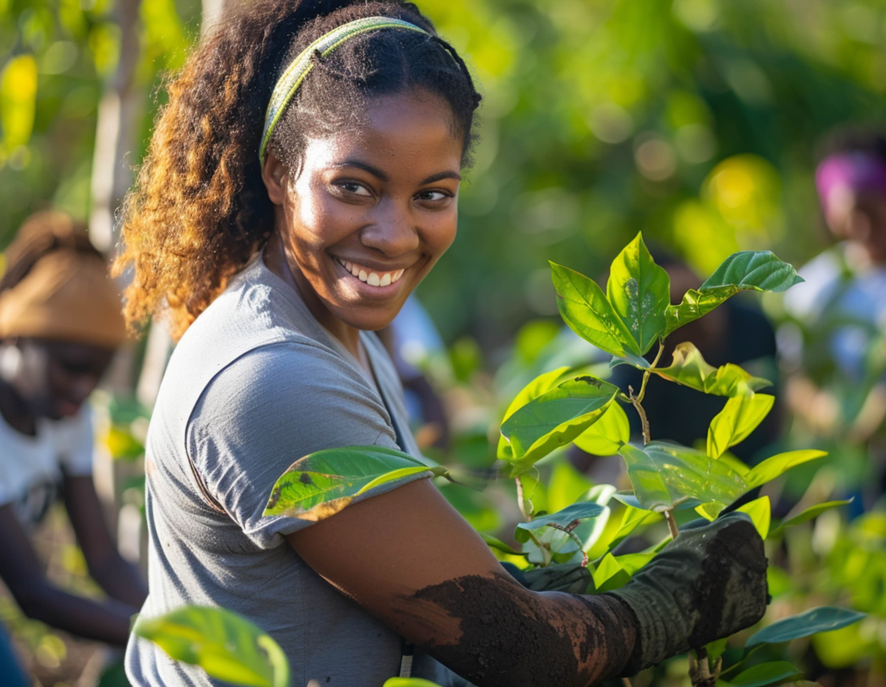 a woman cultivating a plant